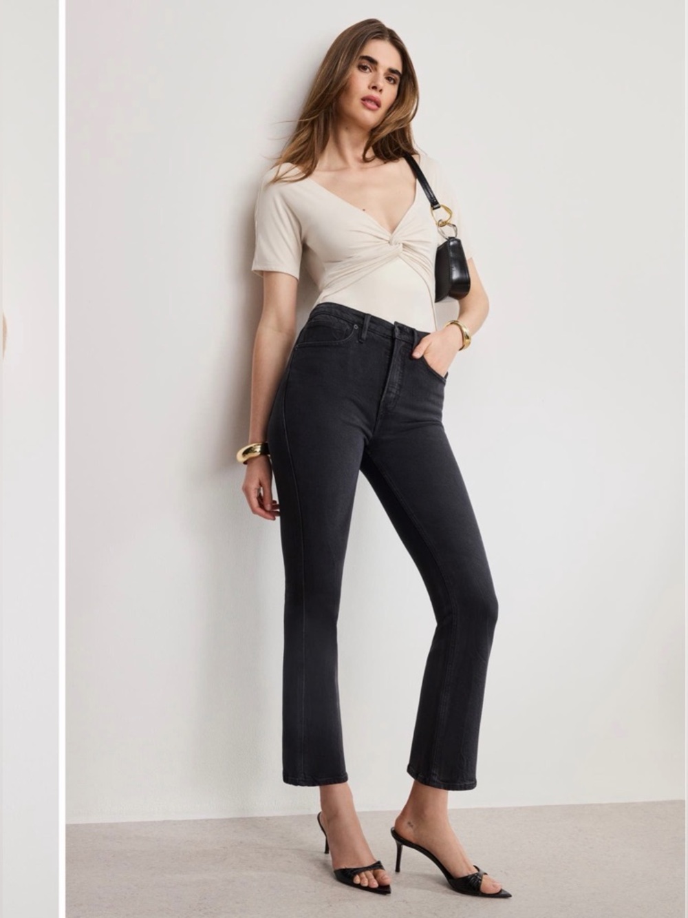 Good American Black boot cut/slight flair frayed hem